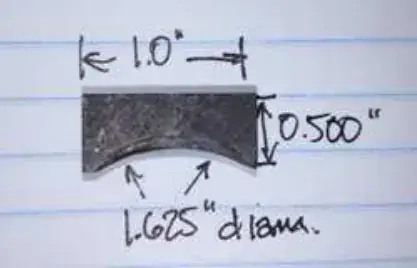 A hand-drawn sketch of a bushing with its dimensions