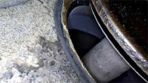 Closeup of the healthy O-320 exhaust valve, with a good view of the seat and valve-sealing surface.