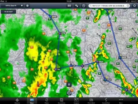 A weather radar map on a tablet showing storms along a route