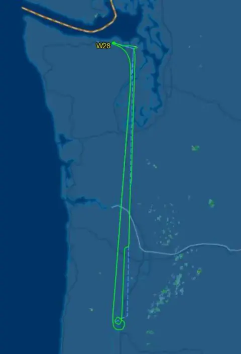 A moving-map screen showing the flight track along the coast