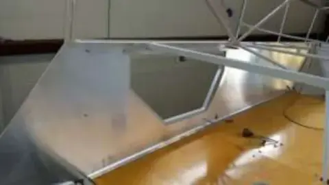 An aluminum panel fitted inside the fuselage frame