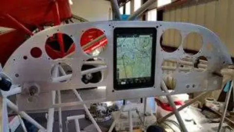 An instrument panel in progress with a tablet-style display