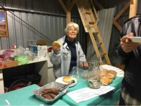 Donna Sommer serving our hungry members their burgers