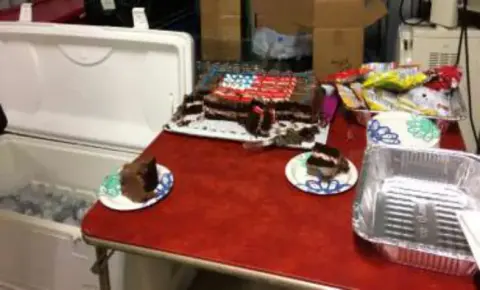 A table with chocolate cake and other desserts