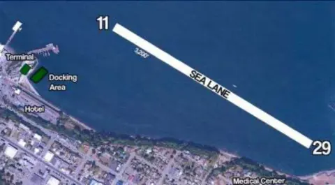 A satellite view of a seaplane lane marked on the water