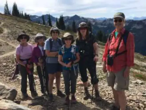 A group of hikers on a mountain trail