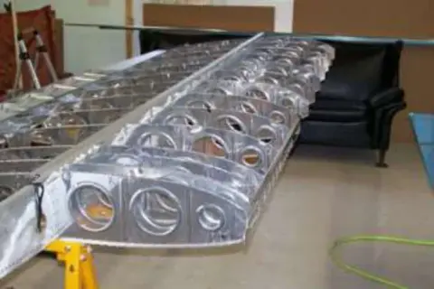 Inside of a metal wing with lightening holes