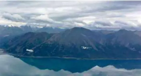 Mountains and a lake seen from the air