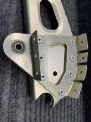 A machined metal aircraft bracket