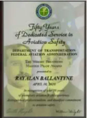 A framed certificate for fifty years of dedicated service in aviation safety