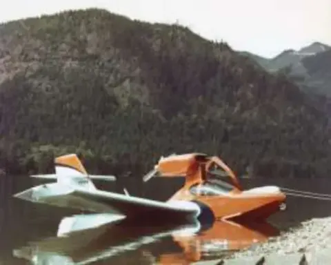 Dave Woodcock's Super Coot amphibian on a mountain lake