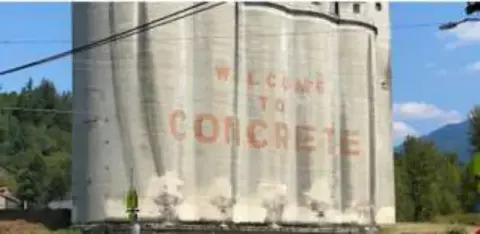 A painted grain silo reading Concrete
