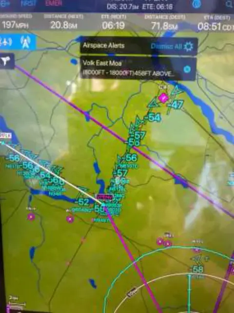 A tablet showing a moving map with a flight route