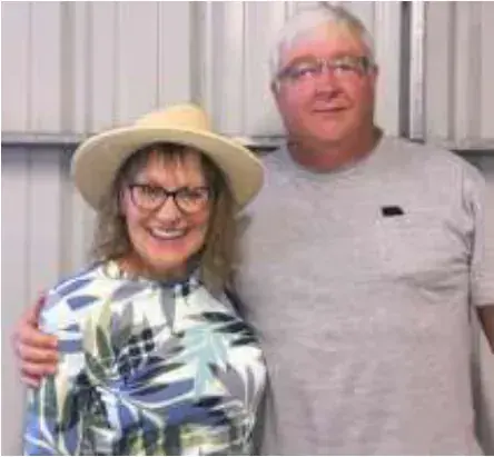A smiling couple posing together