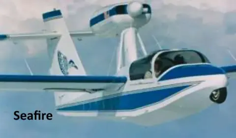 A white and blue amphibious airplane in flight
