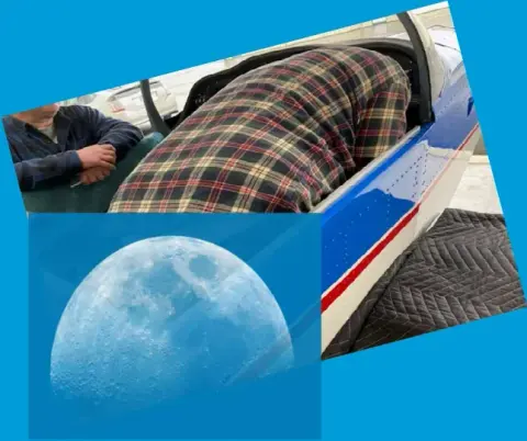 A member working on the wing of the club airplane in the hangar, with a photo of the blue moon set into the corner