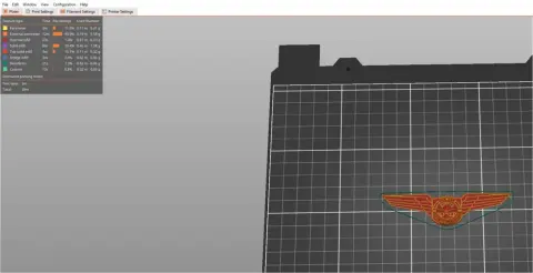 An orange wings design on a 3D printer bed in software