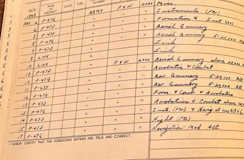 Handwritten entries in an old logbook