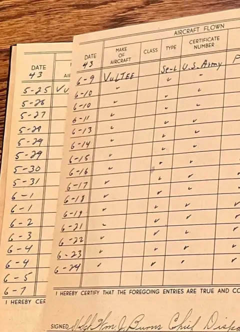 A page of a handwritten pilot logbook