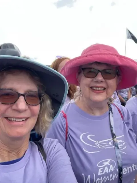 Two women in sun hats taking a selfie