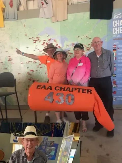 Ray and Lisa Ballantyne, Barry and Tracy Halsted in front of the Chapter map.