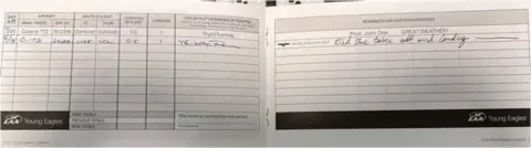 Logbook pages with a checkride endorsement