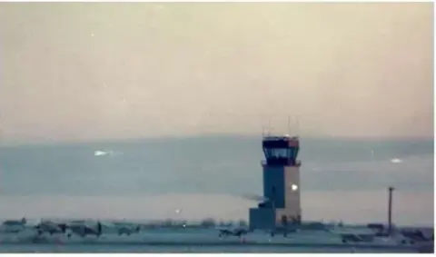 Bethel control tower seen across flat tundra