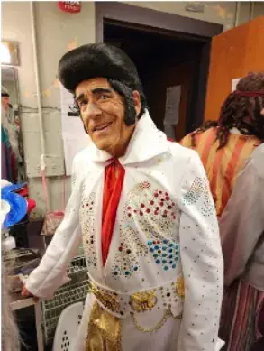 Costumed Elvis impersonator at a chapter gathering