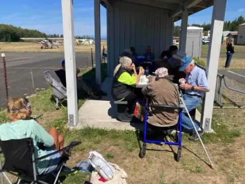 The Clan at the picnic table