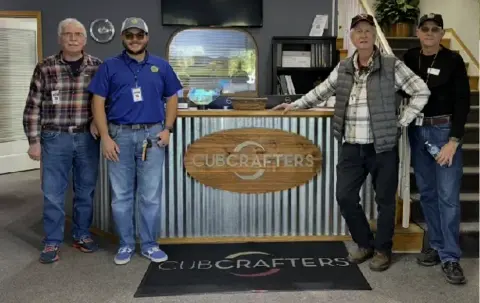 Members standing at the front counter of an FBO lobby