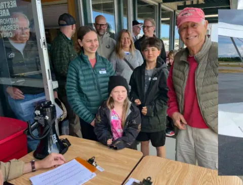 Volunteers at the dispatch table matching Young Eagles with pilots