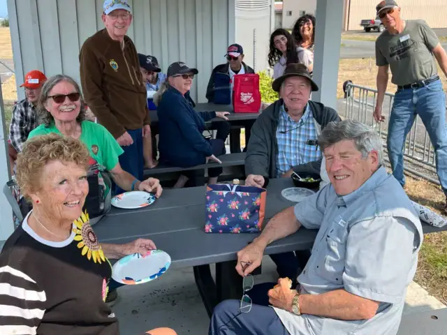 Fly-out group at the picnic tables at Orcas Island airport