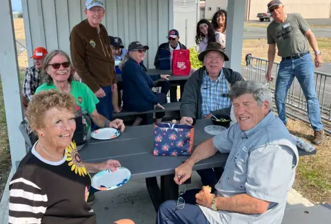 Fly-out group at the picnic tables at Orcas Island airport