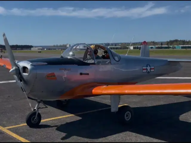 Kevin’s silver and orange Ercoupe on the ramp