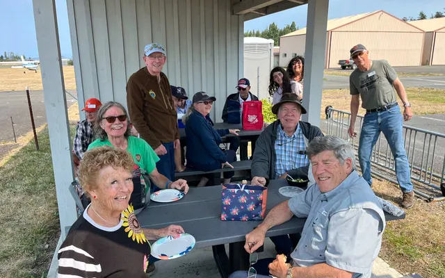 Fly-out group at the picnic tables at Orcas Island airport